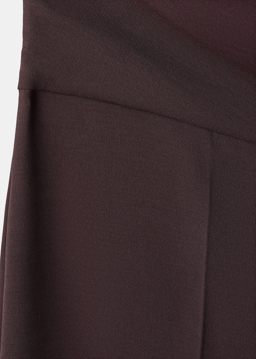 Jumpsuit with asymmetrical neck and bow