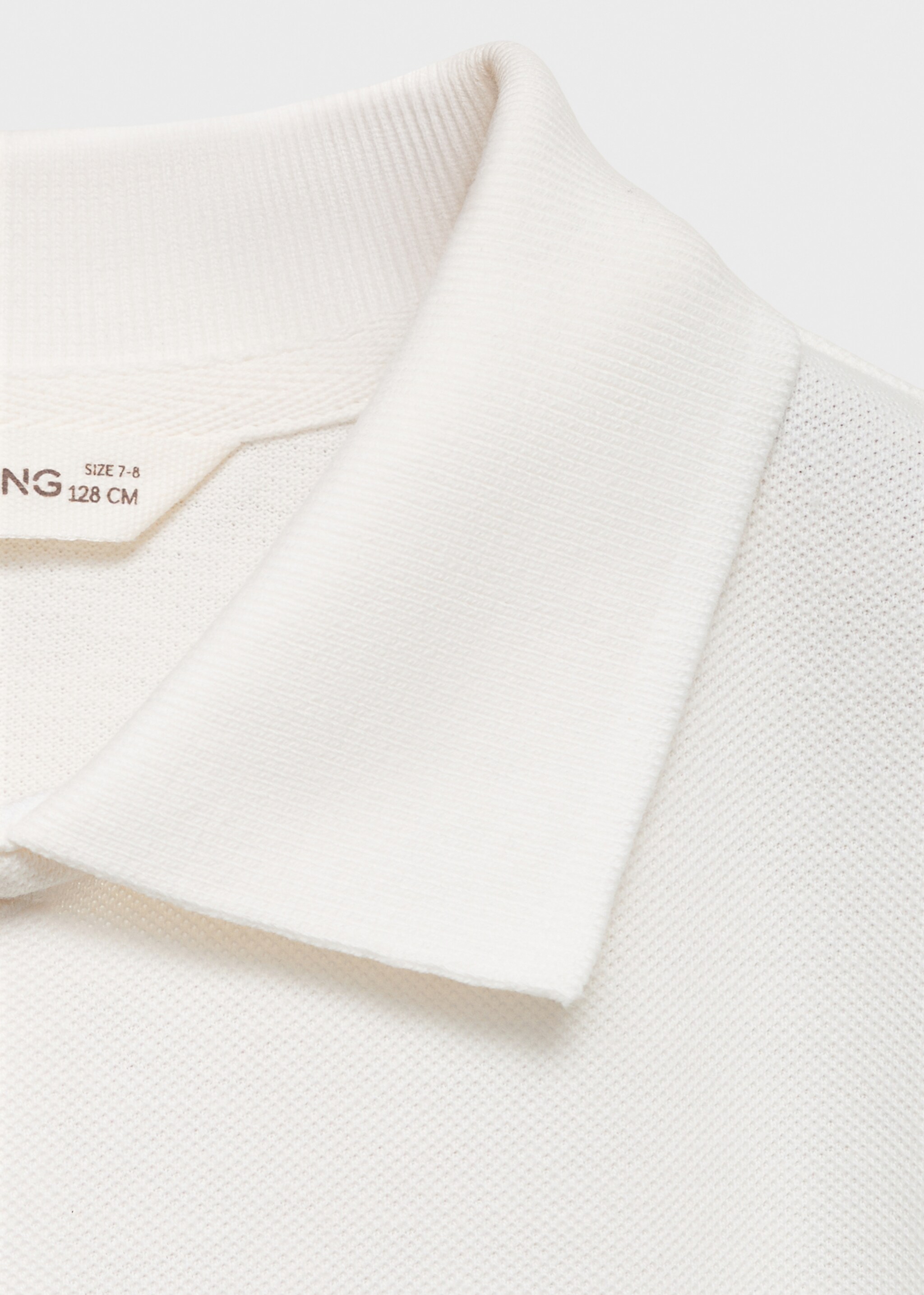 Buttoned knitted polo shirt - Details of the article 8