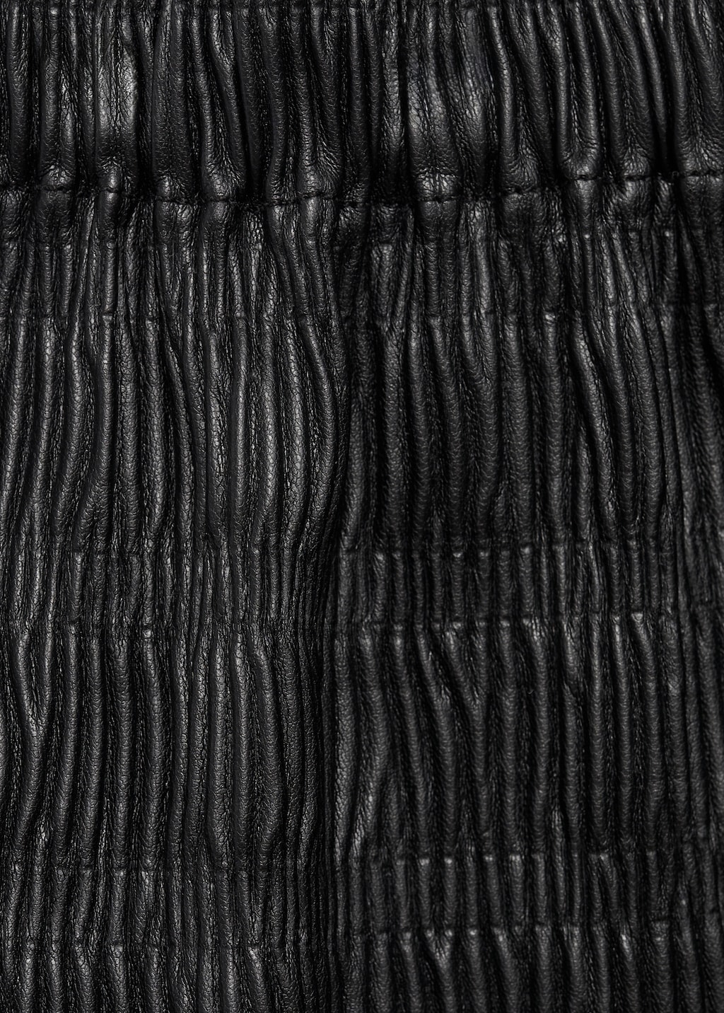 Pleated leather-effect skirt