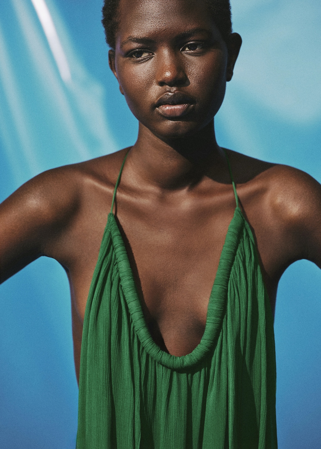 Top with pleated back neckline