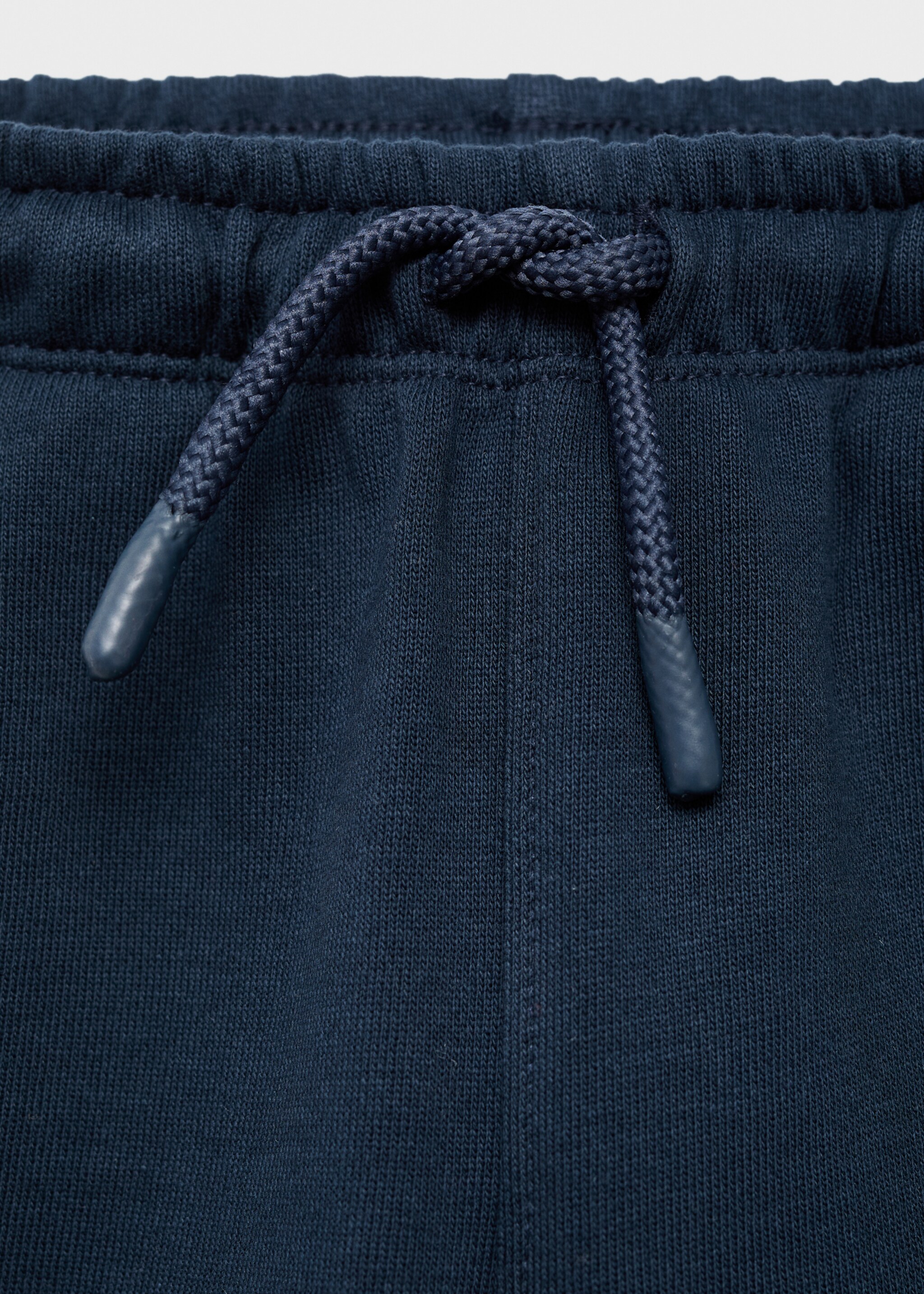 Snoopy embroidered joggers - Details of the article 8, Navy. Ref: 17075797-00.