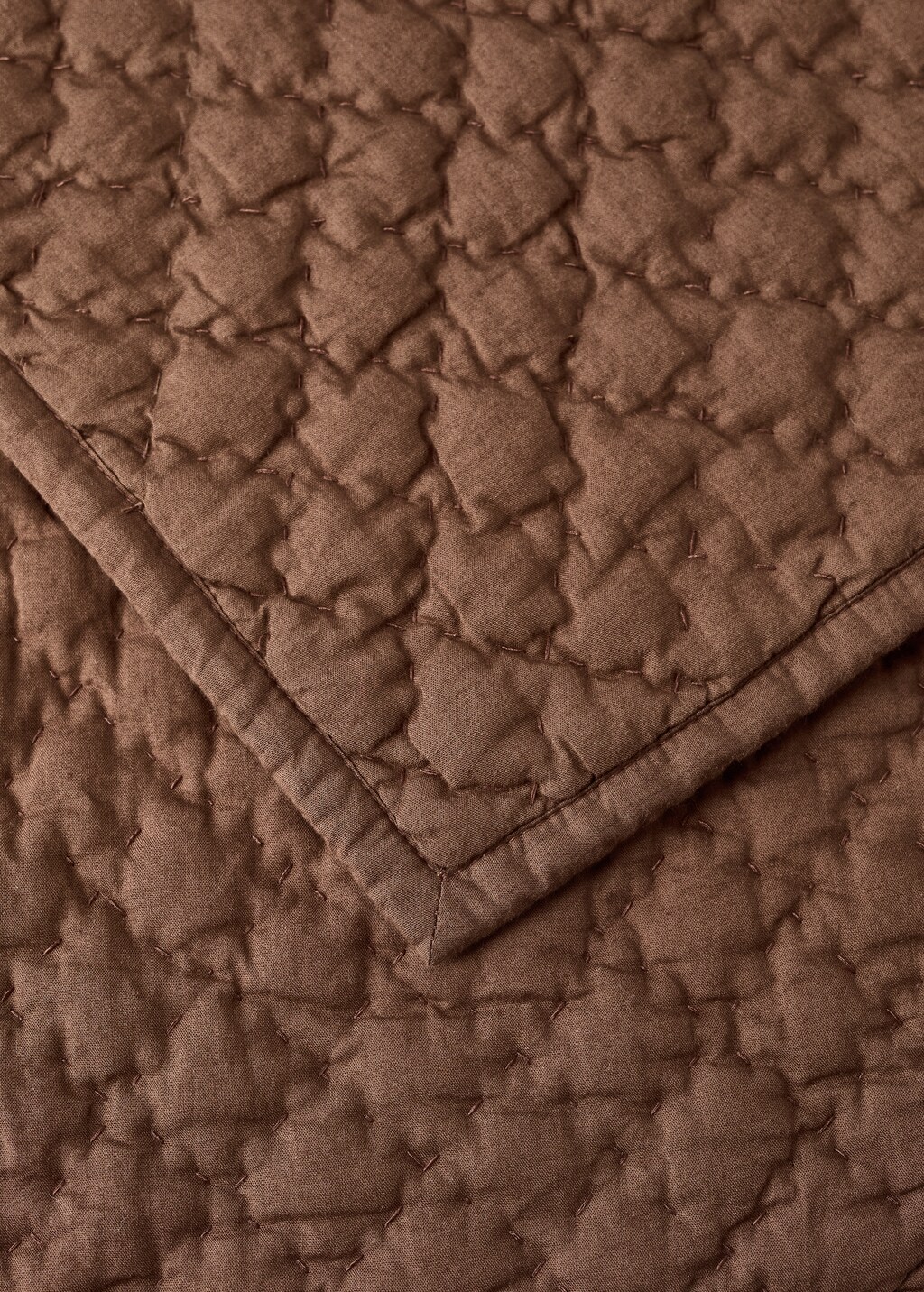 Hand-stitched cotton bedspread for cot