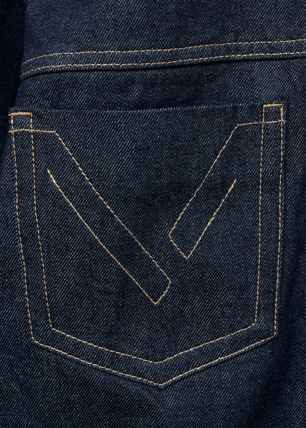 Denim jacket with decorative stitching