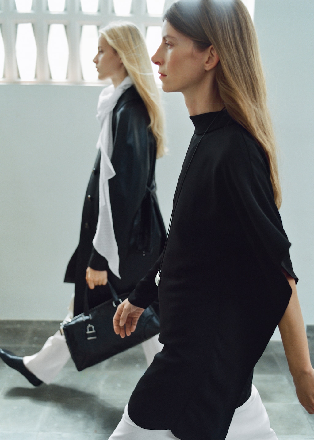 Turtleneck dress with asymmetrical sleeves