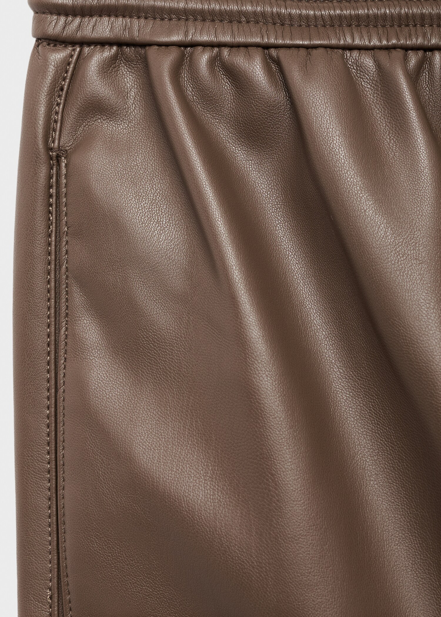 Leather-effect elastic waist trousers - Details of the article 0