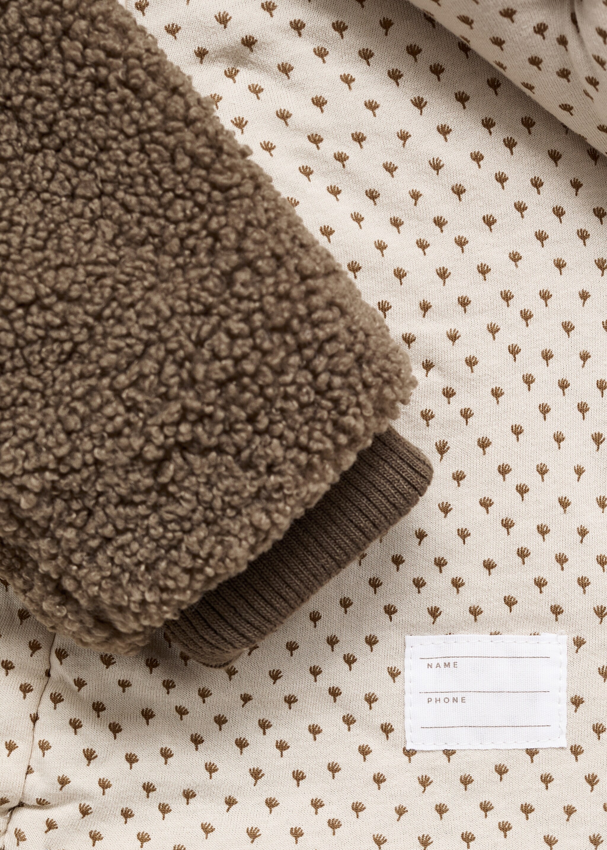 Lambskin hooded earflap hat - Details of the article 0, Chocolate. Ref: 17075977-00.