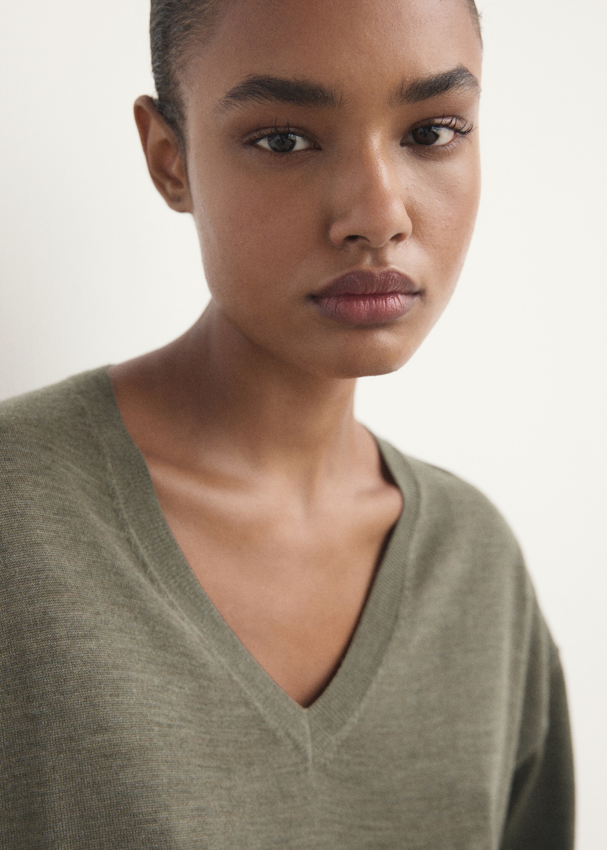 Wool pyjama sweater - Details of the article 1, Green. Ref: 17076722-00.