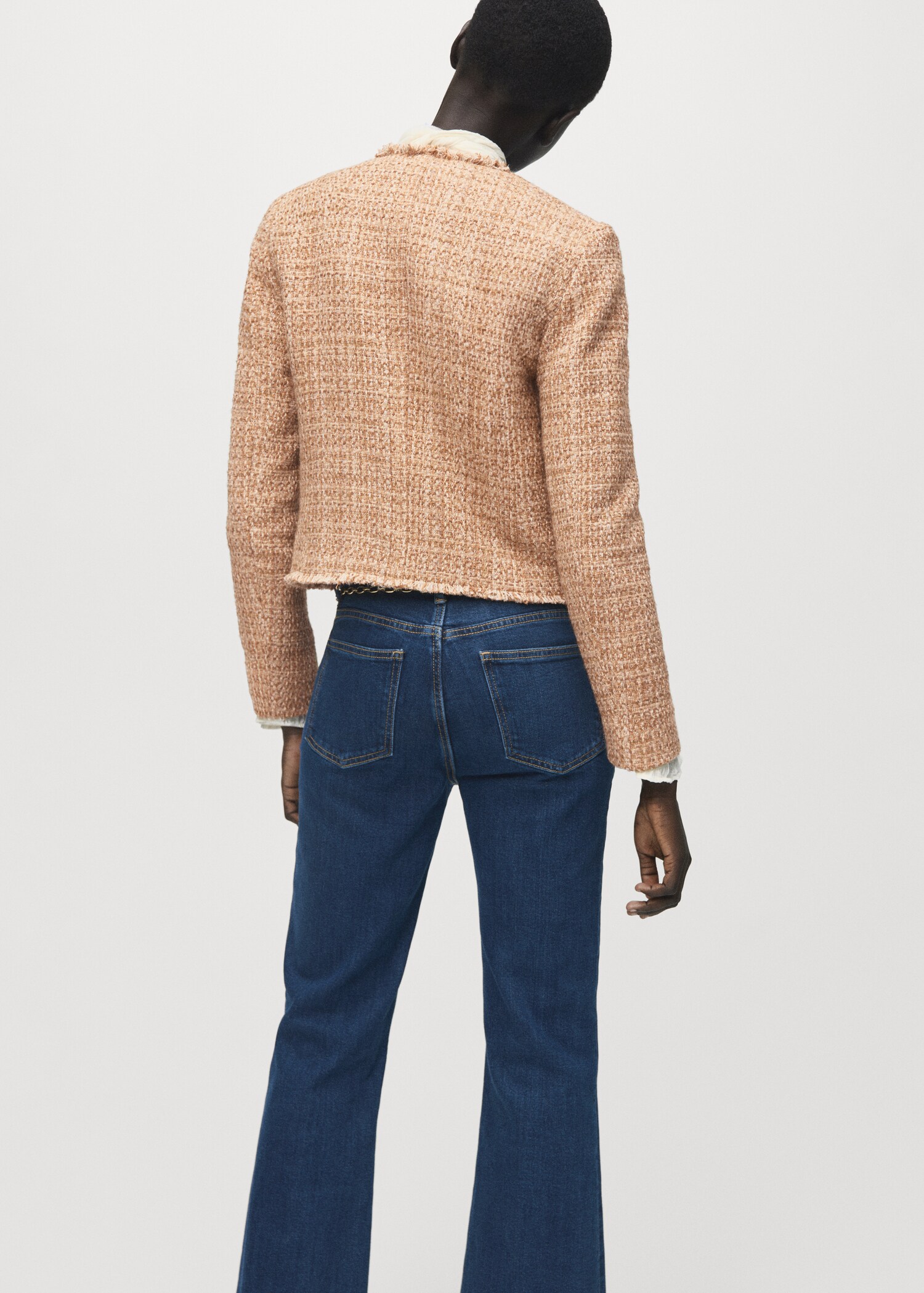 Tweed jacket with frayed ends - Reverse of the article