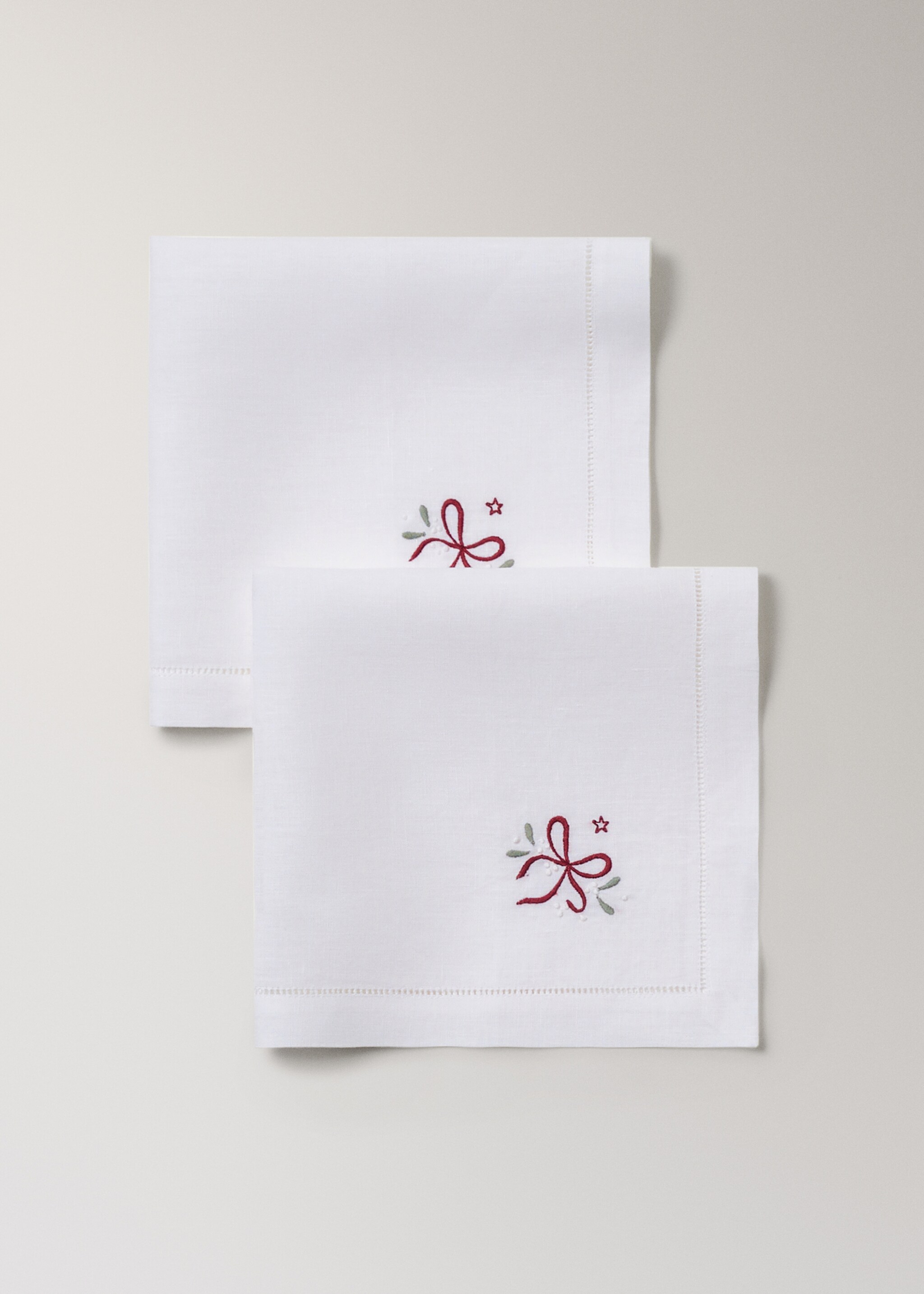 Embroidered napkins with Christmas bow design - Details of the article 1, White. Ref: 17077785-00.