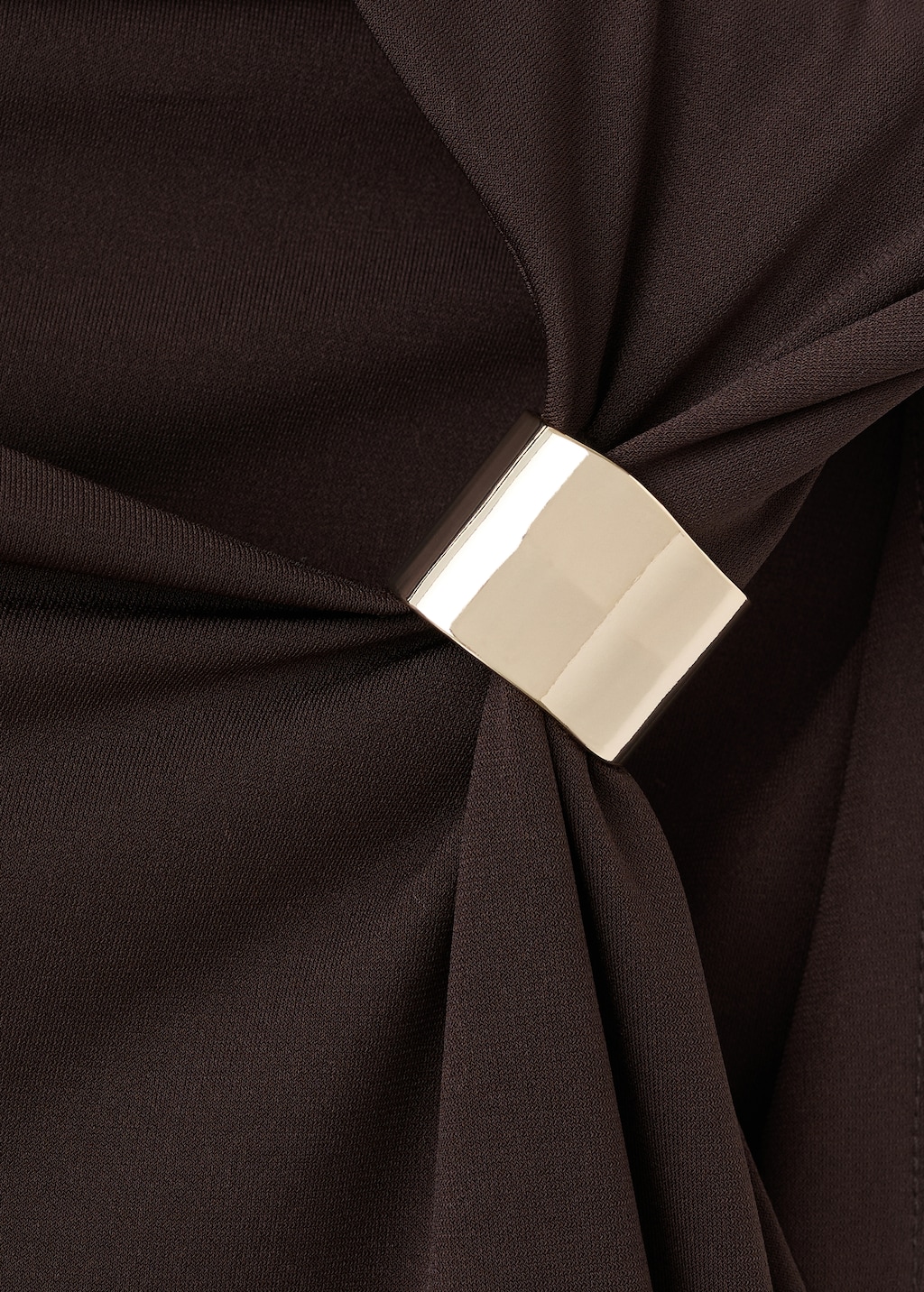 Dress with asymmetrical neck and metallic detail