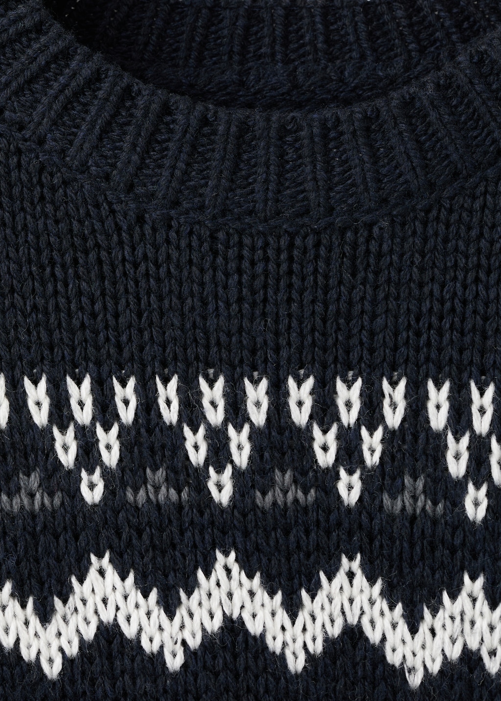 Knitted sweater with trim