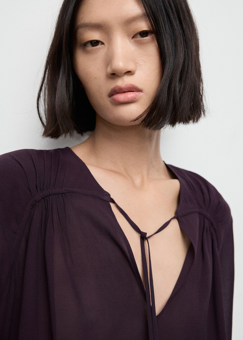V-neck blouse with tie - image 4
