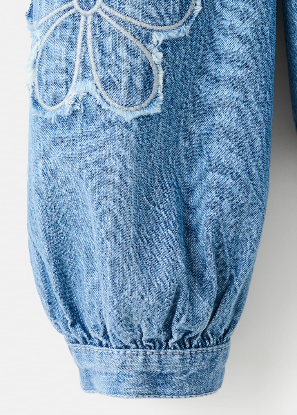 Embroidered denim blouse