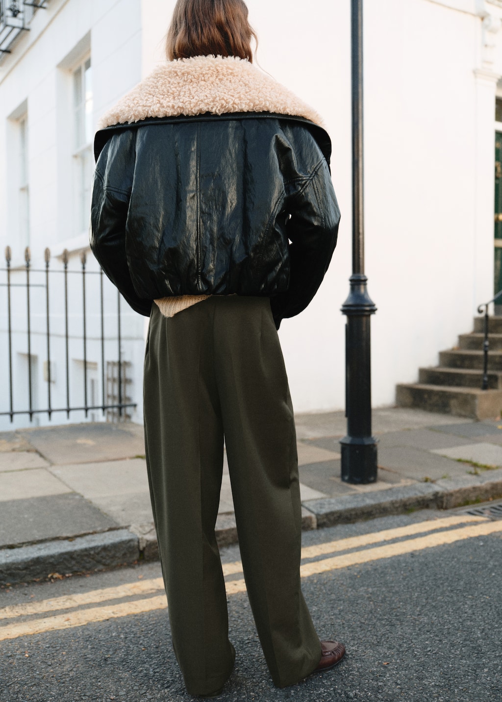 Pleated trousers with button detail