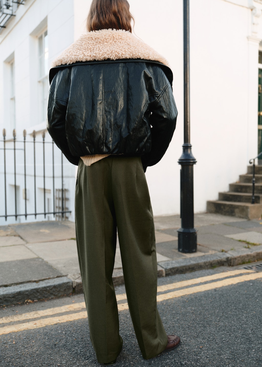 Pleated trousers with button detail