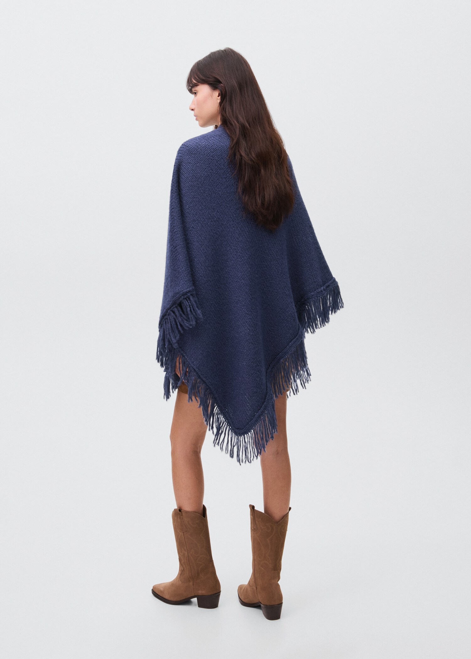 Knitted poncho with tassels - Reverse of the article
