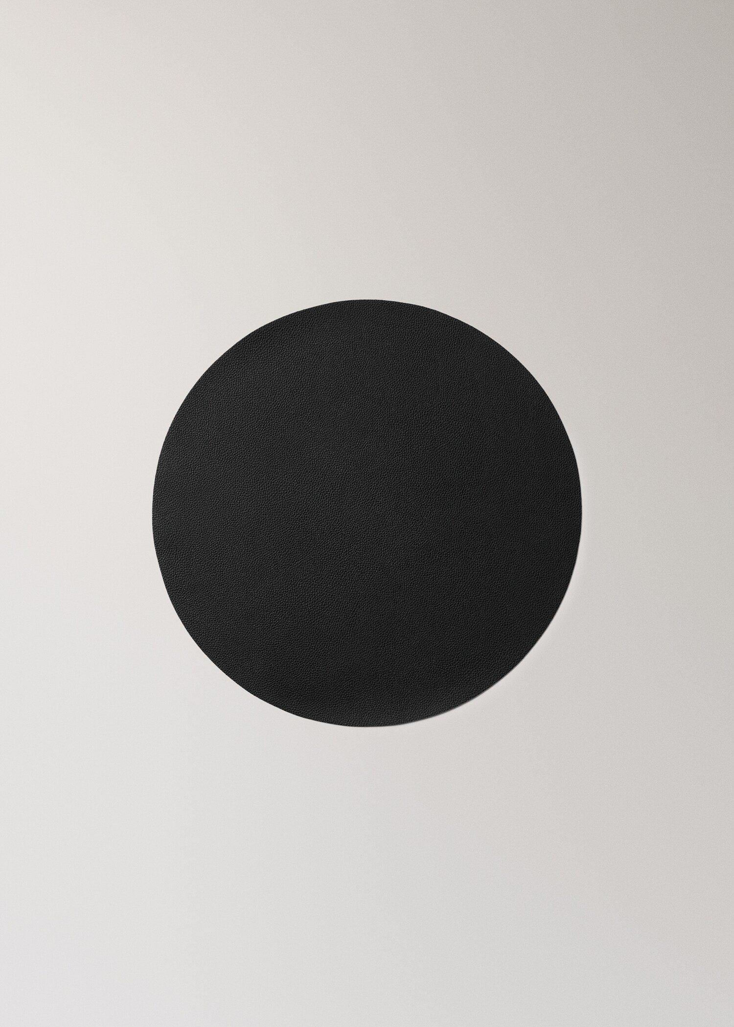 Round leather-effect placemat - Article without model