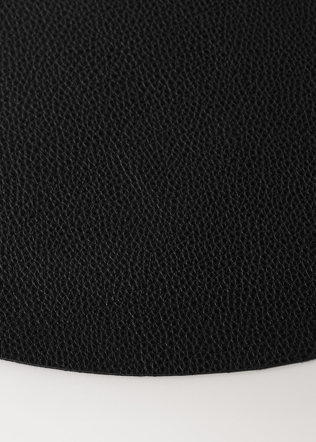 Round leather-effect placemat