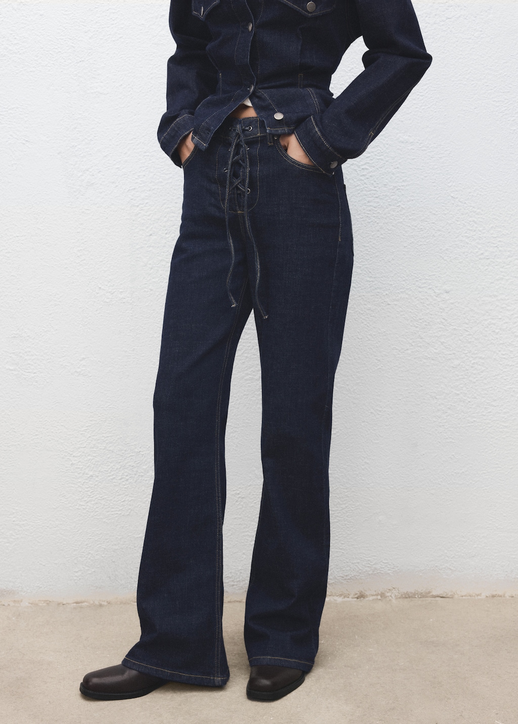 Flared jeans with drawstrings