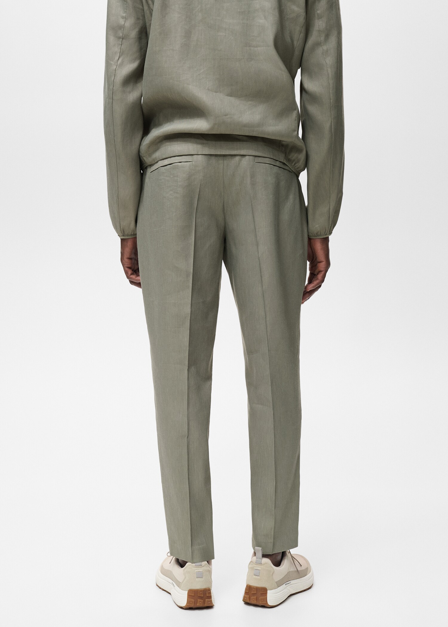 Pleated linen pants - Reverse of the article