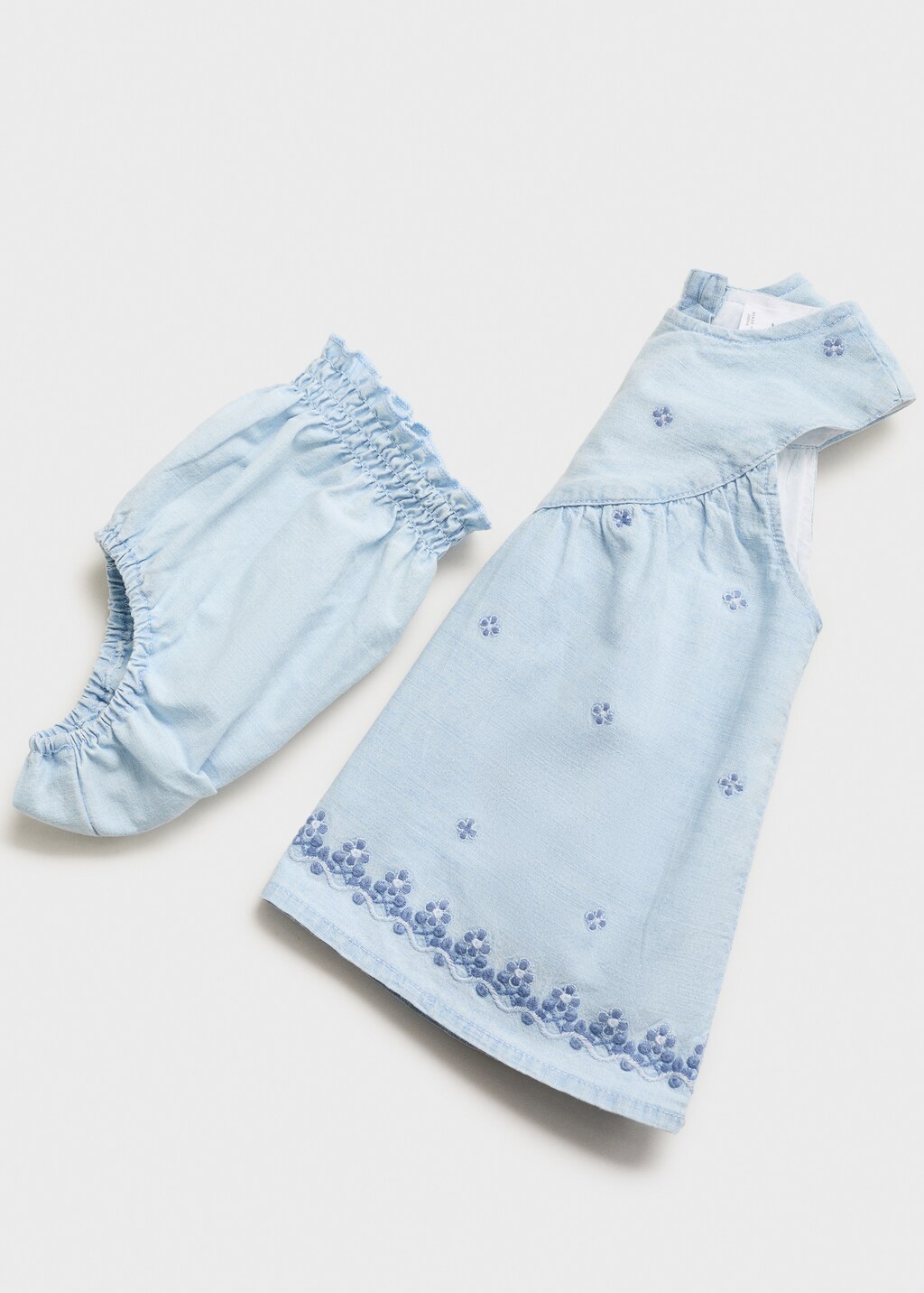 Dress and frog with embroidered details