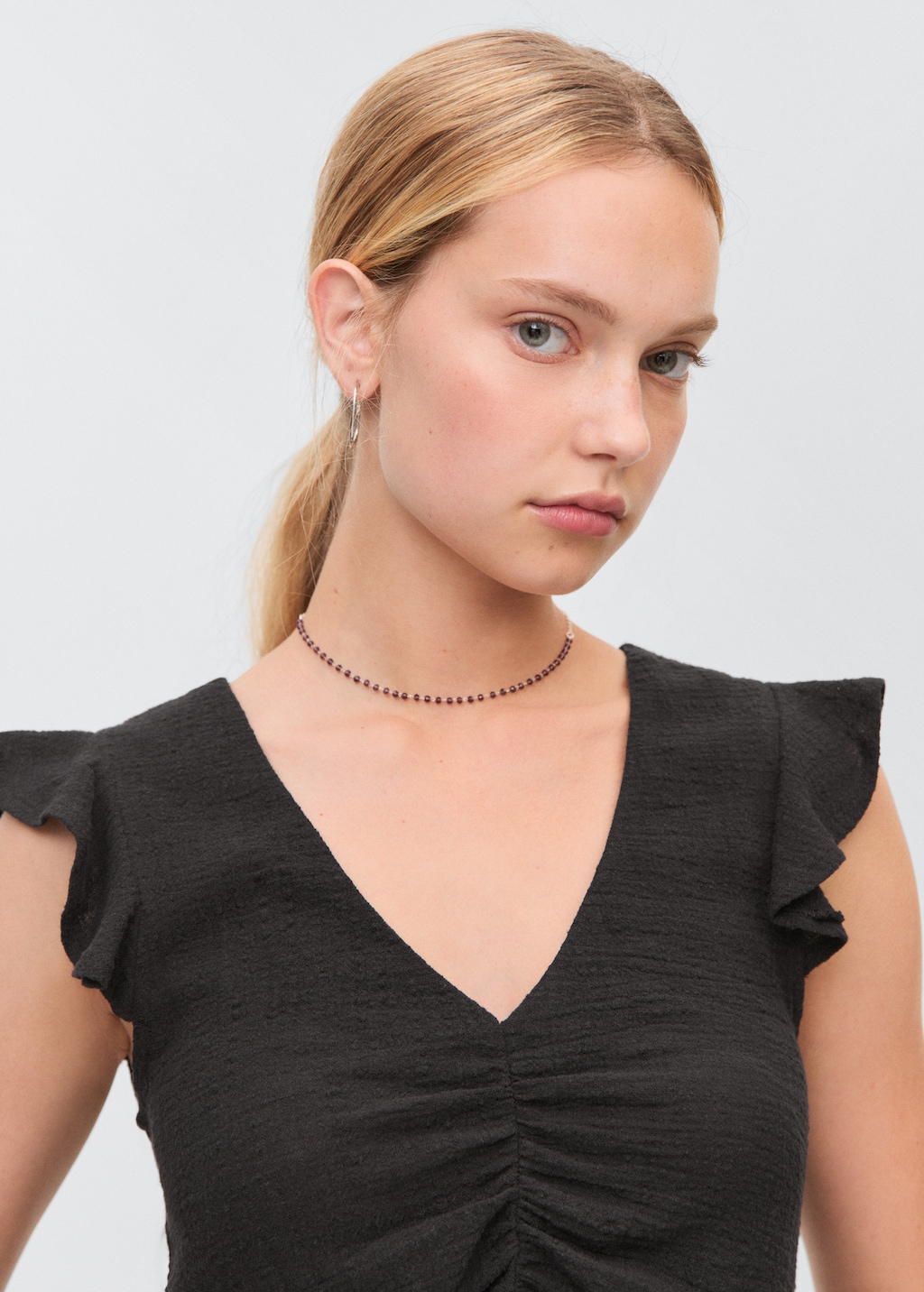 Ruffled-sleeve blouse