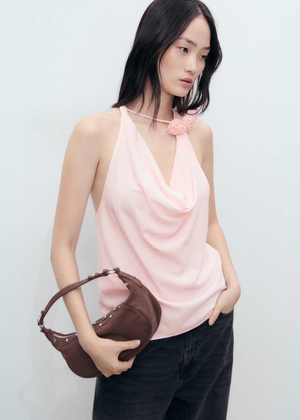 Draped blouse with flower detail