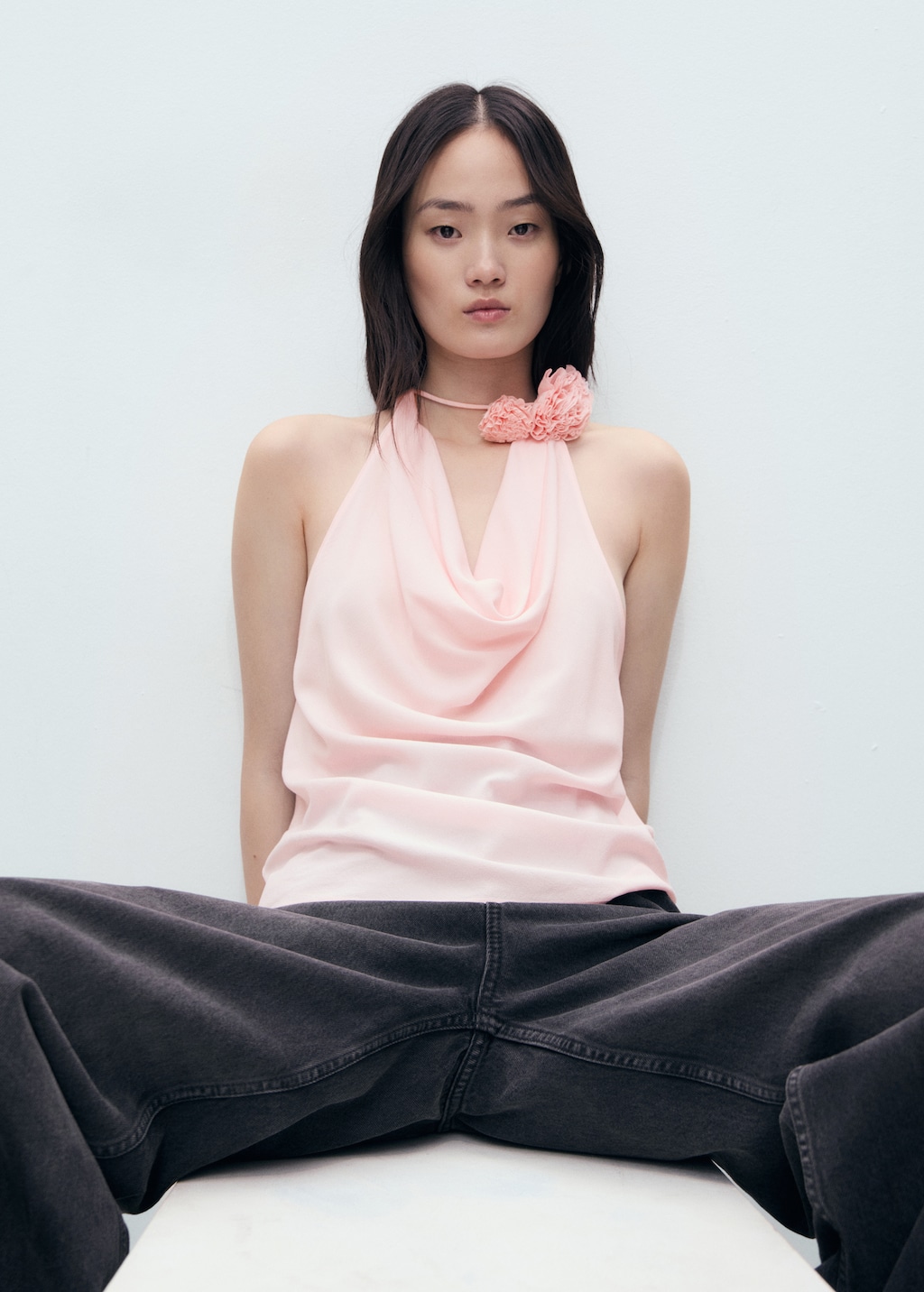 Draped blouse with flower detail