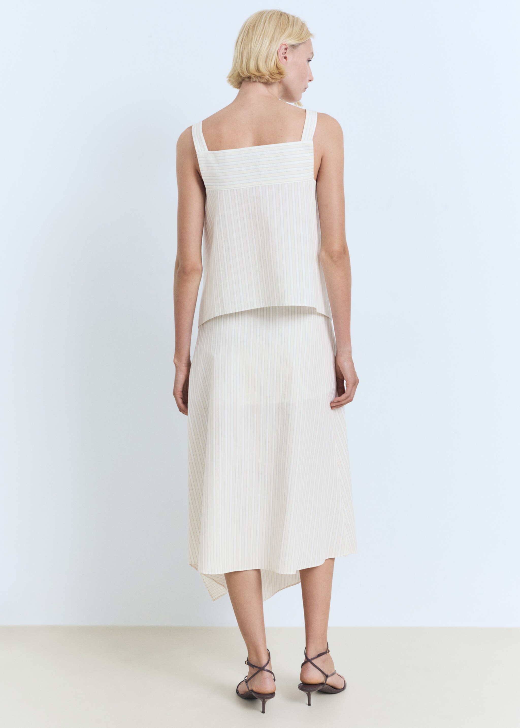 Striped asymmetric skirt - Reverse of the article