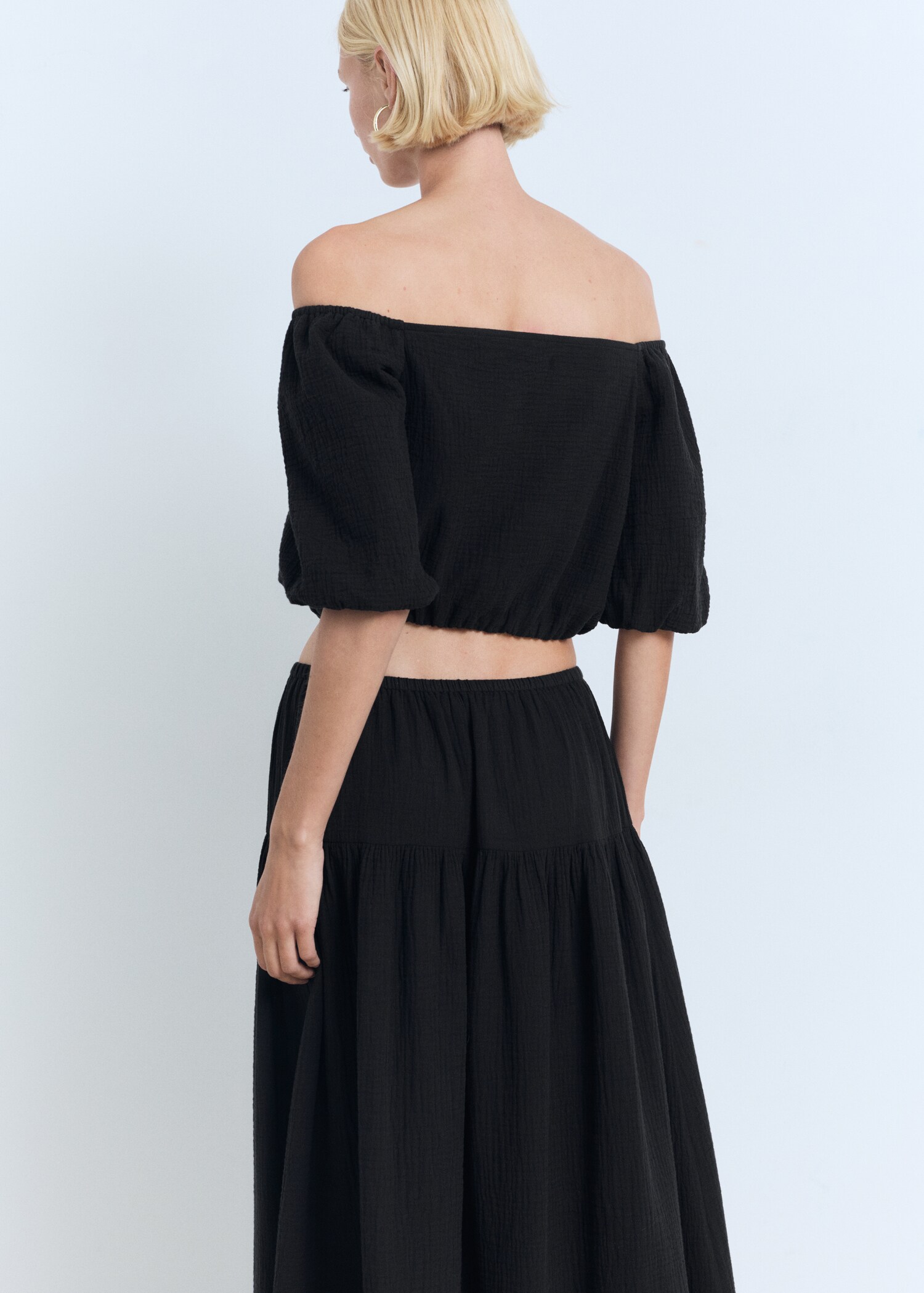 Puffy strapless blouse - Reverse of the article