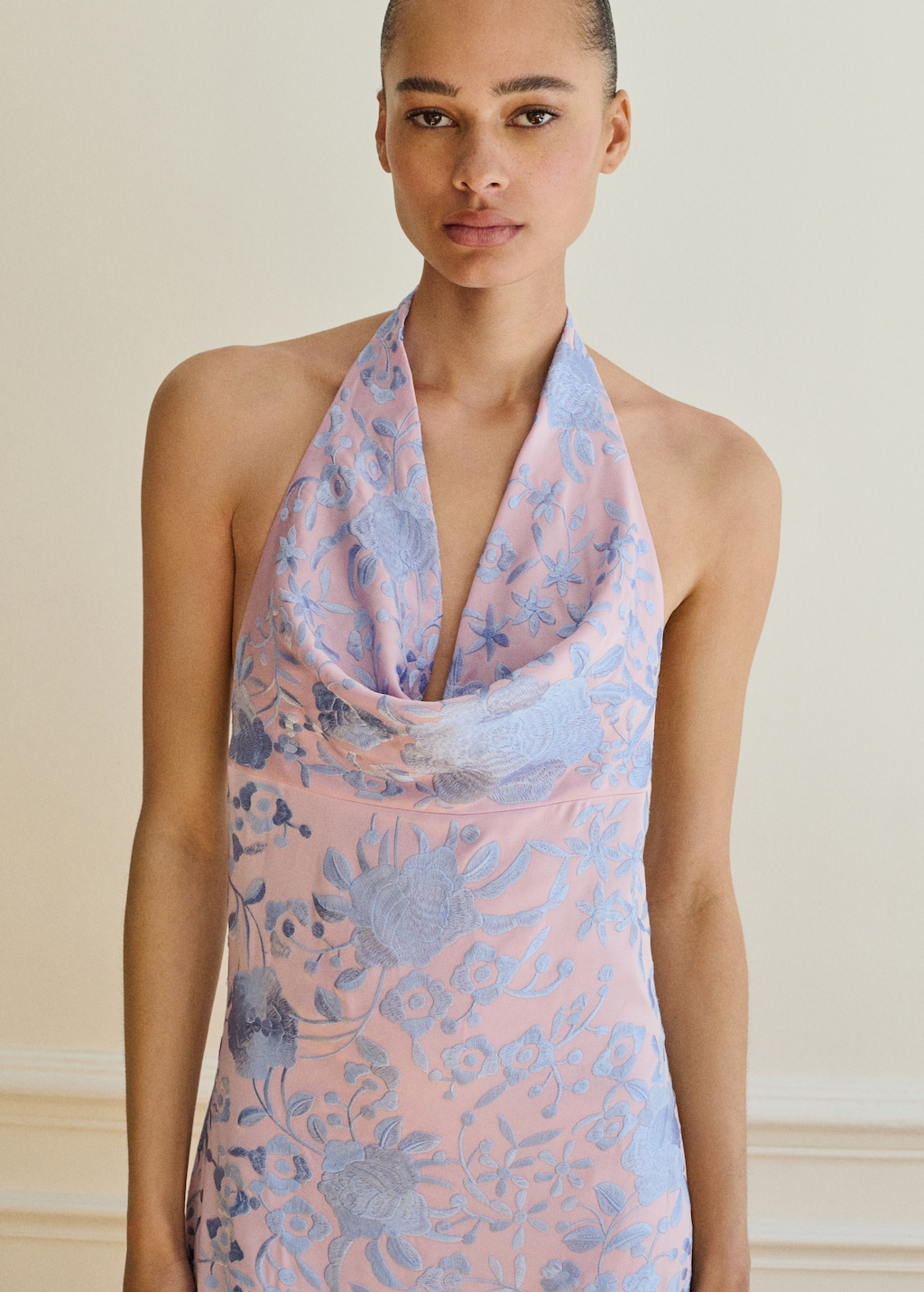 Asymmetrical dress with embroidered fringes