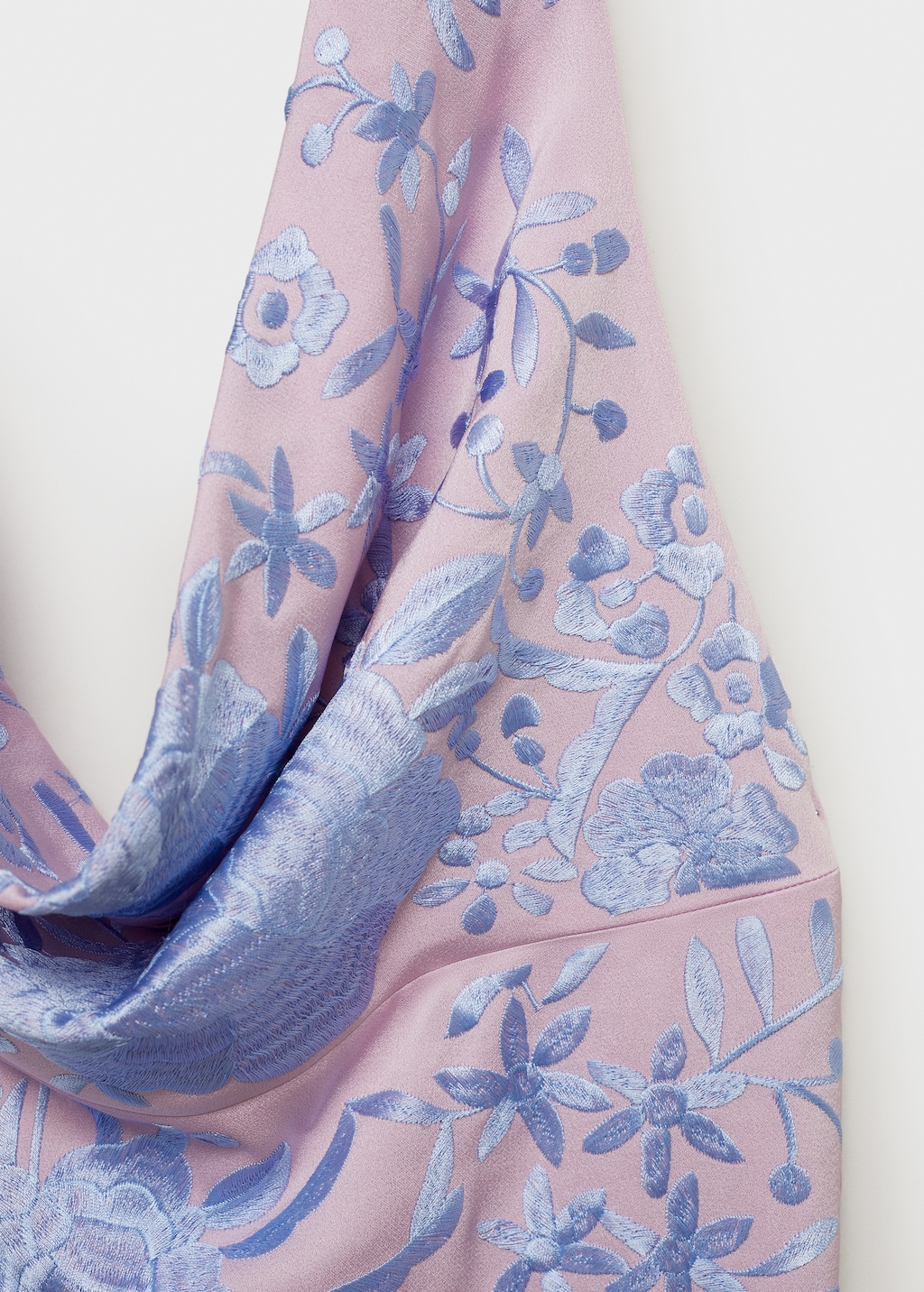 Asymmetrical dress with embroidered fringes