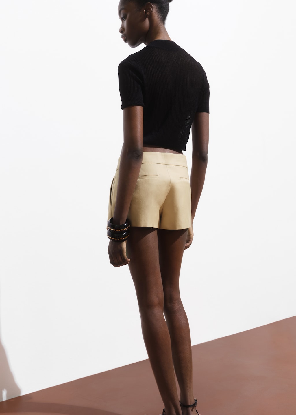Mini-skirt with pleats - image 3