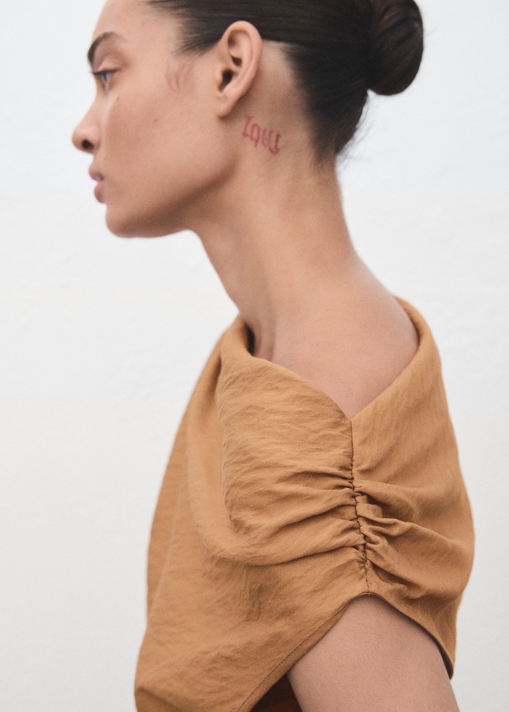 Asymmetric draped gown