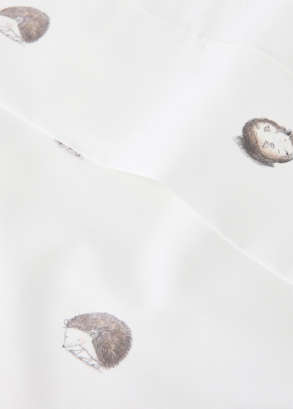 Cotton top sheet with hedgehog print for crib