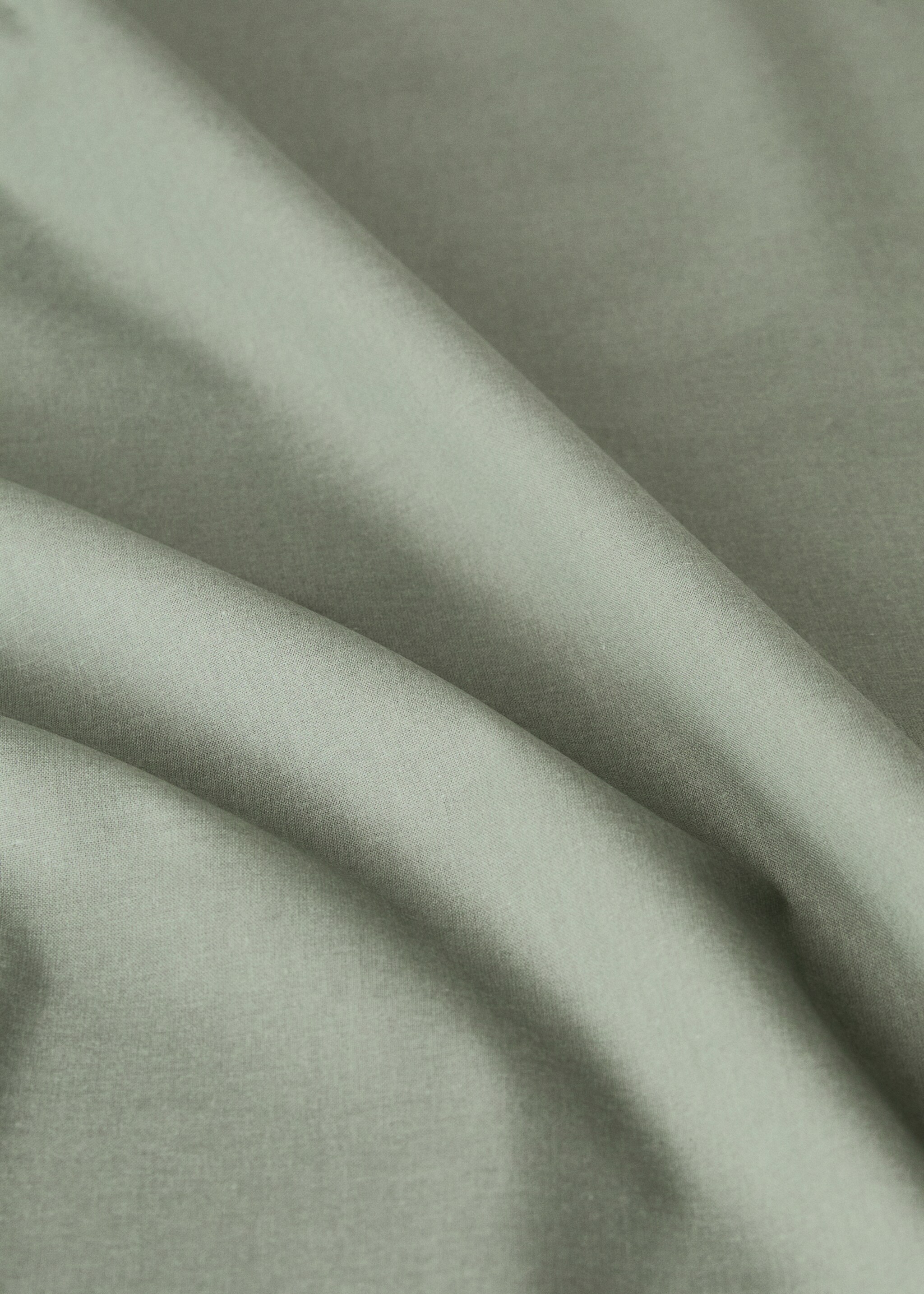 Resin-coated cotton tablecloth with overlock for 2 to 4 diners - Details of the article 2, Medium Green. Ref: 17081584-00.