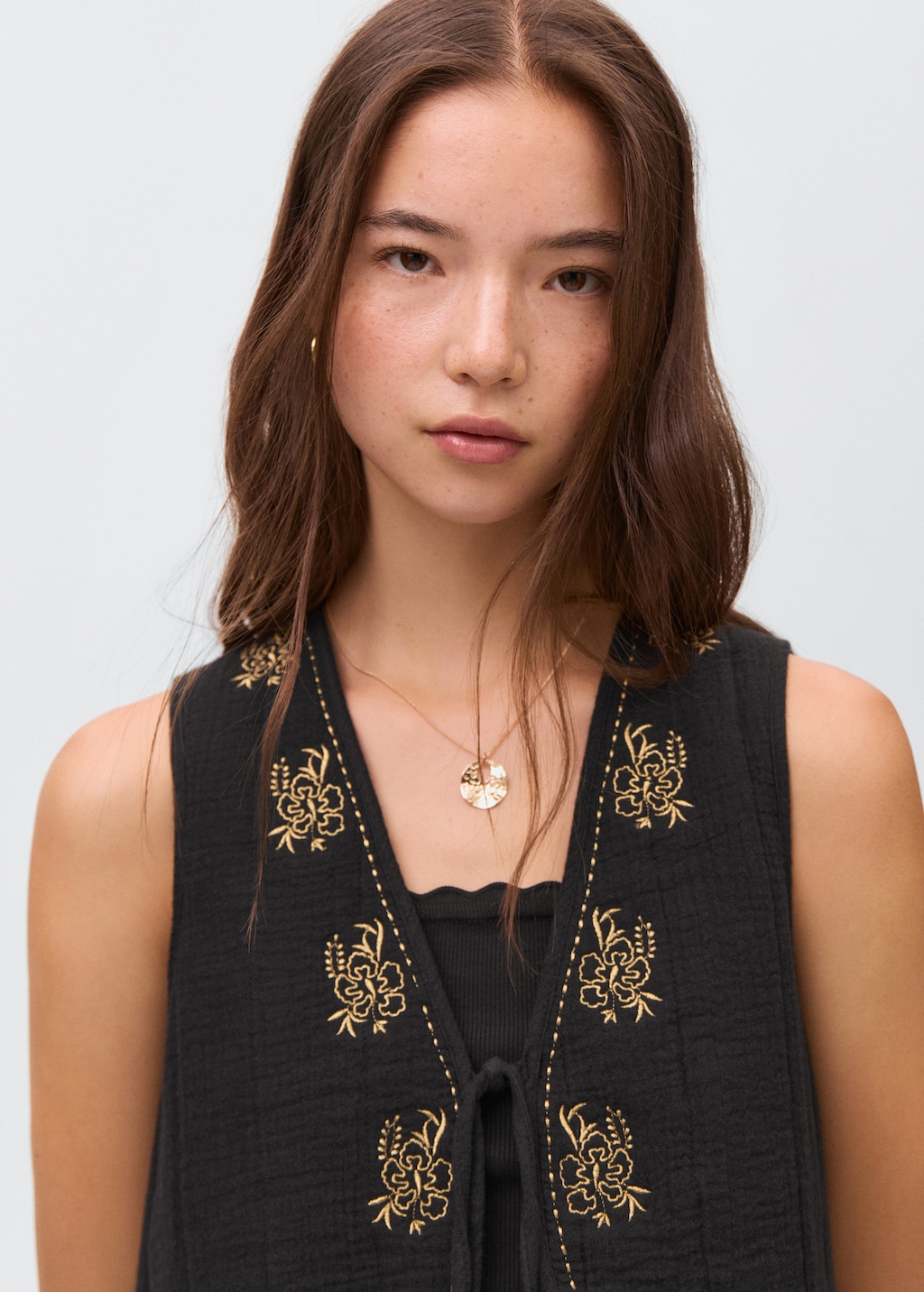 Floral-embroidered vest