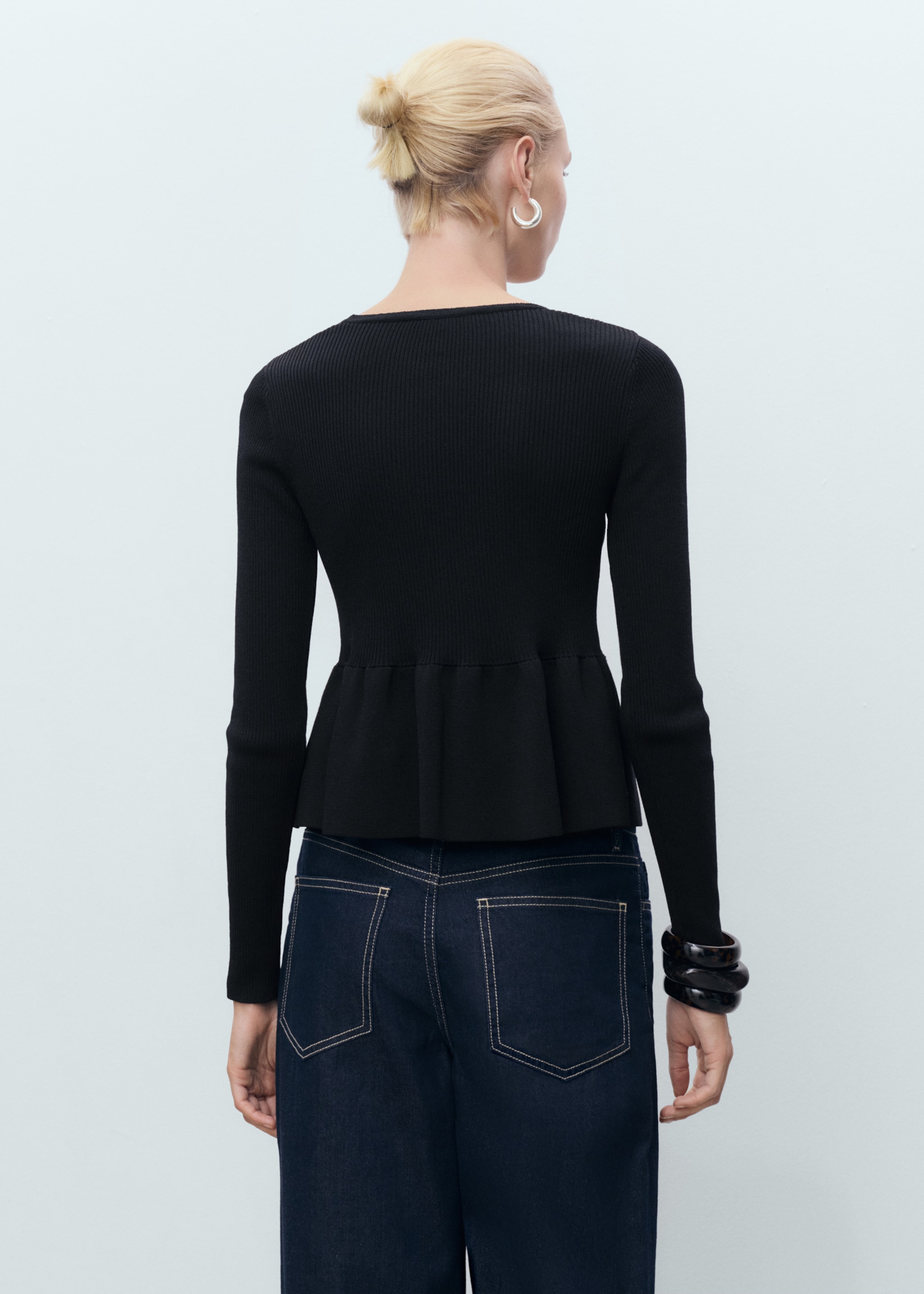 Knitted cardigan with ties - Reverse of the article