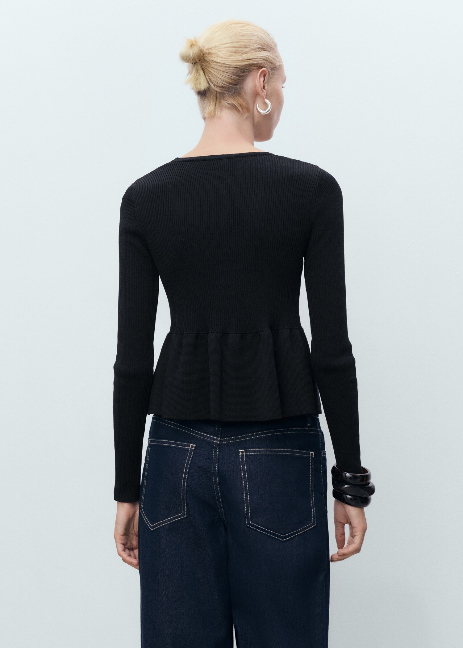 Knitted cardigan with ties - Reverse of the article