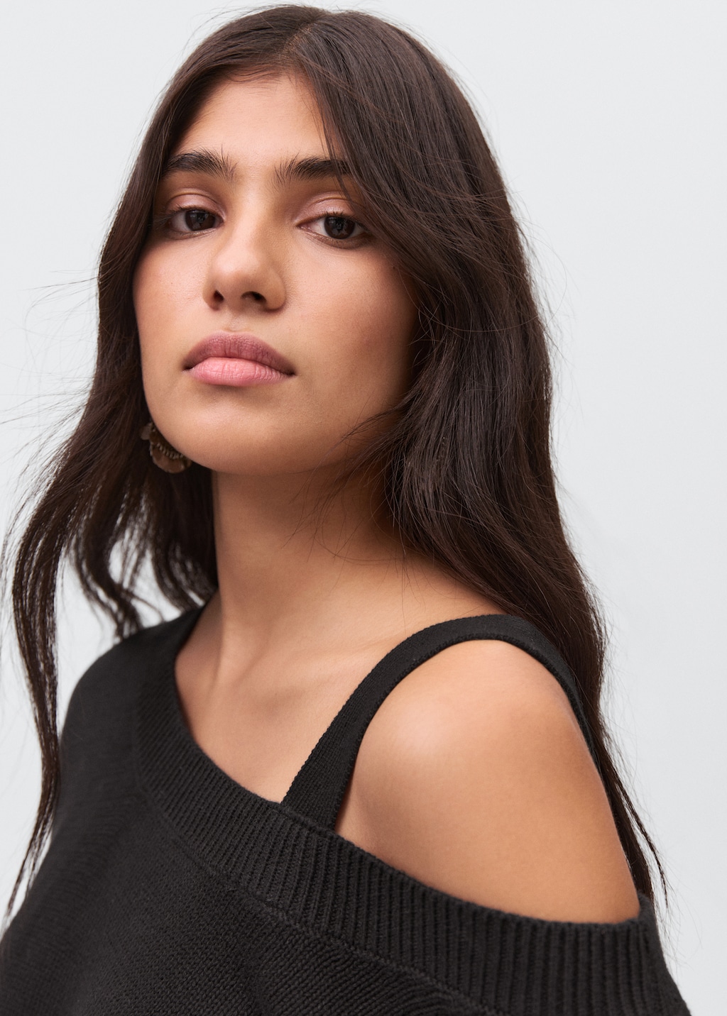 Knitted sweater with cut-out