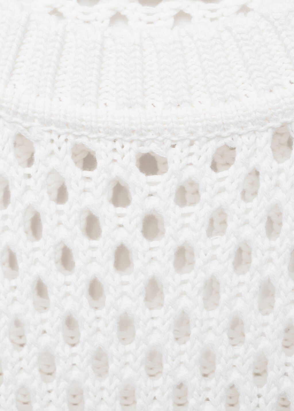 Knit sweater with lace pattern