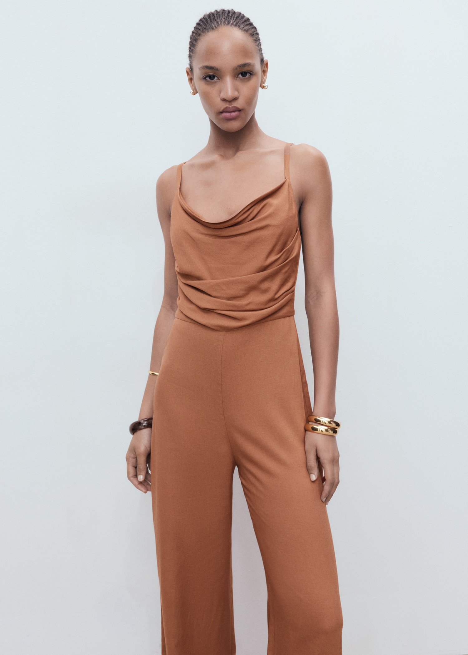 Long jumpsuit with draped neckline MANGO Indonesia