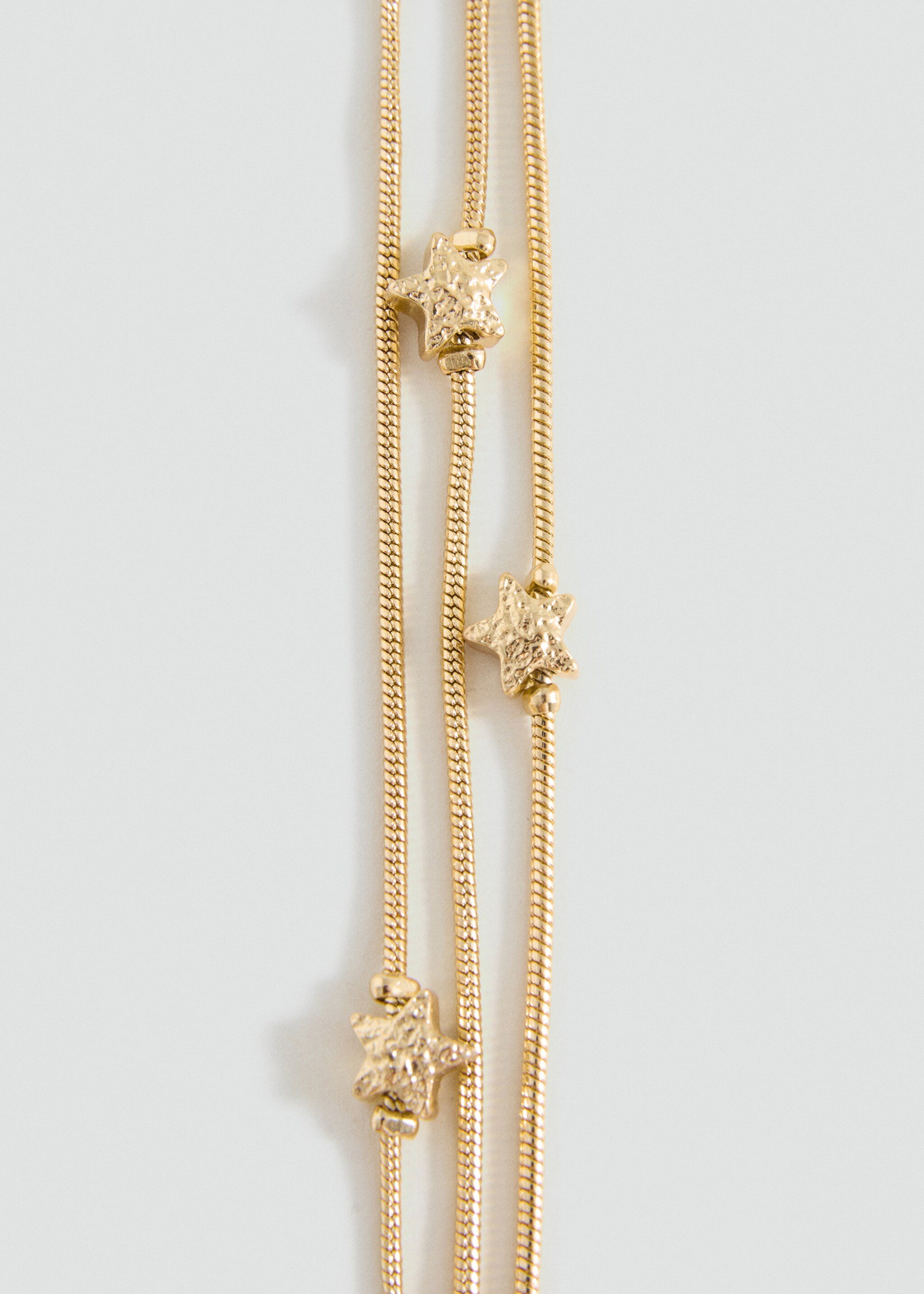 Bracelet pompon étoile - Plan moyen