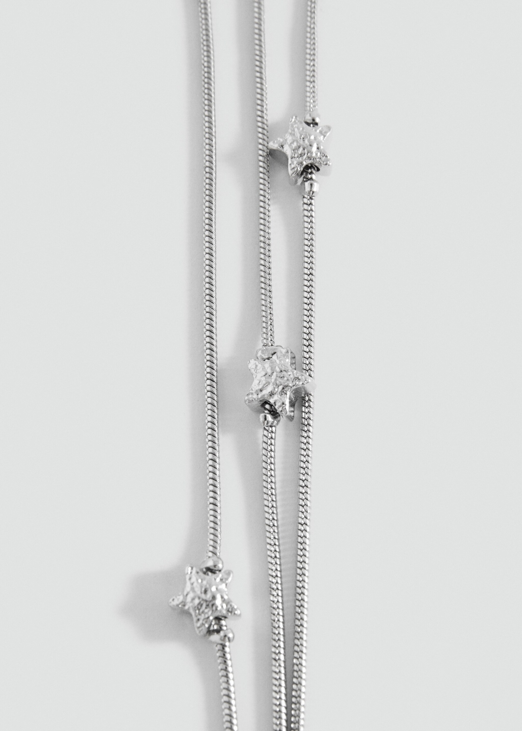 Bracelet pompon étoile - Plan moyen
