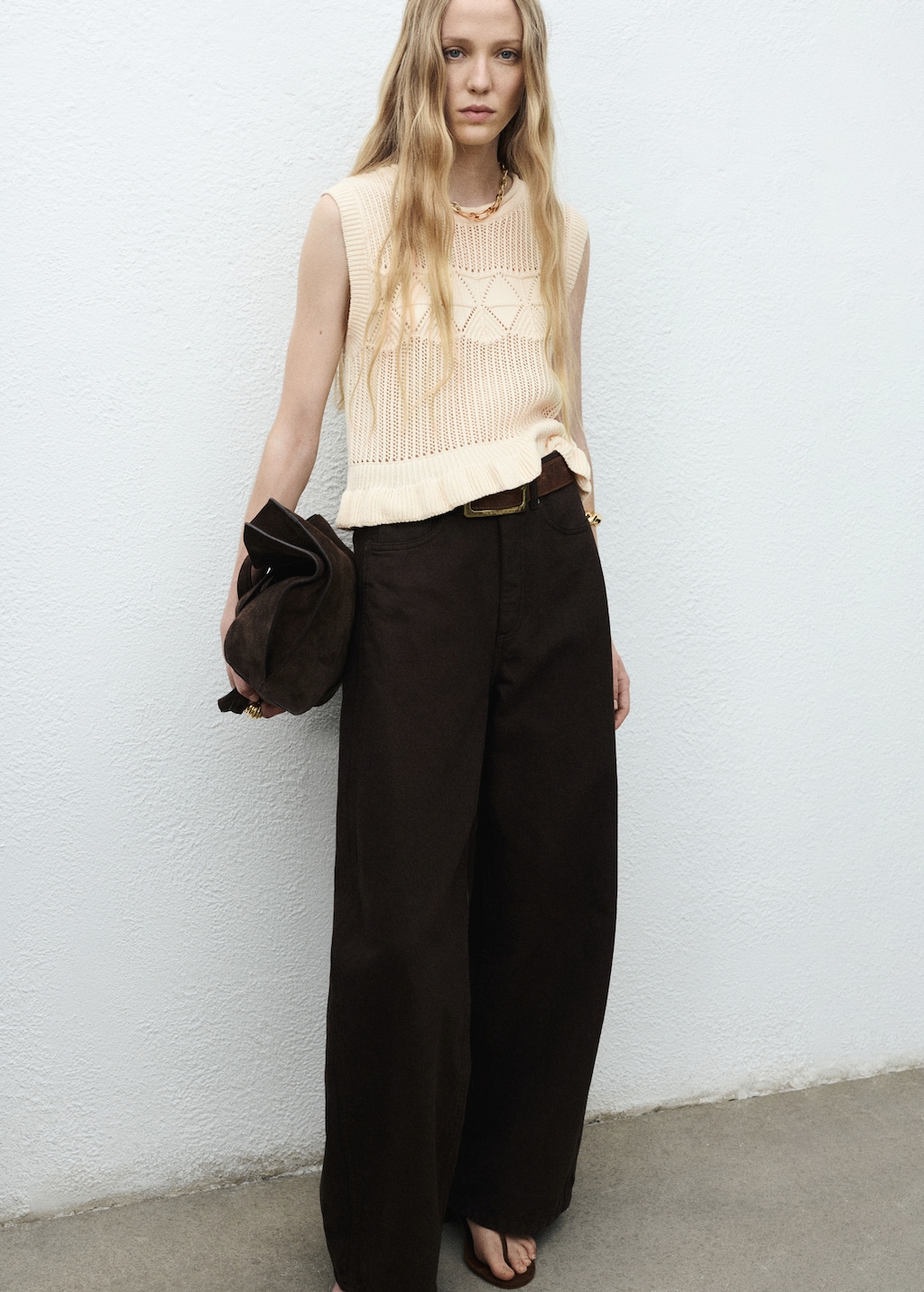 Knit vest with ruffle details