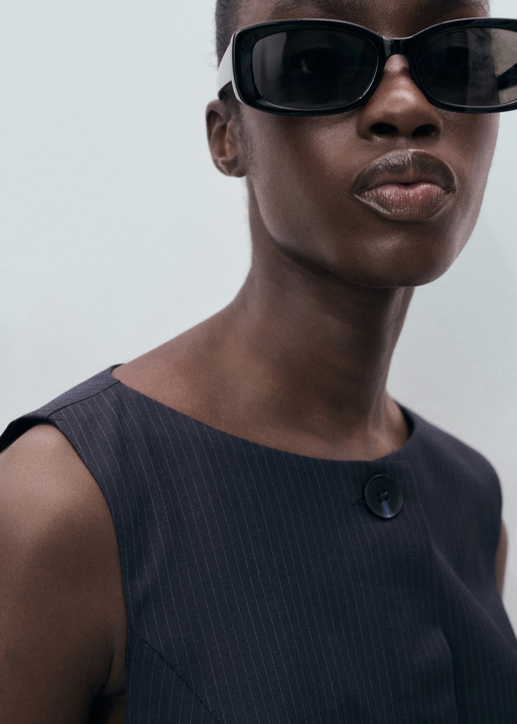 Pinstripe dress with hidden buttons