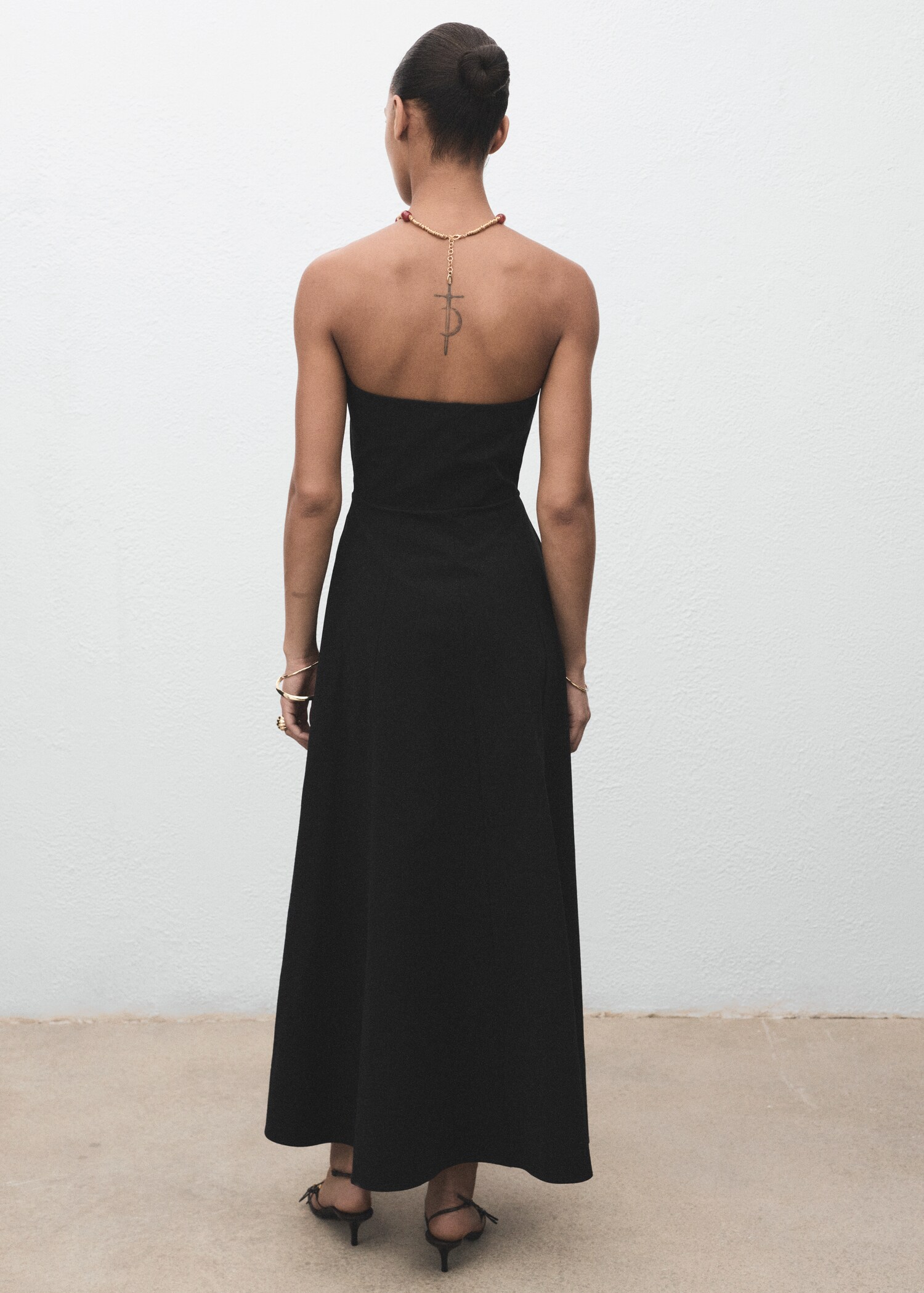 Long strapless dress - Reverse of the article
