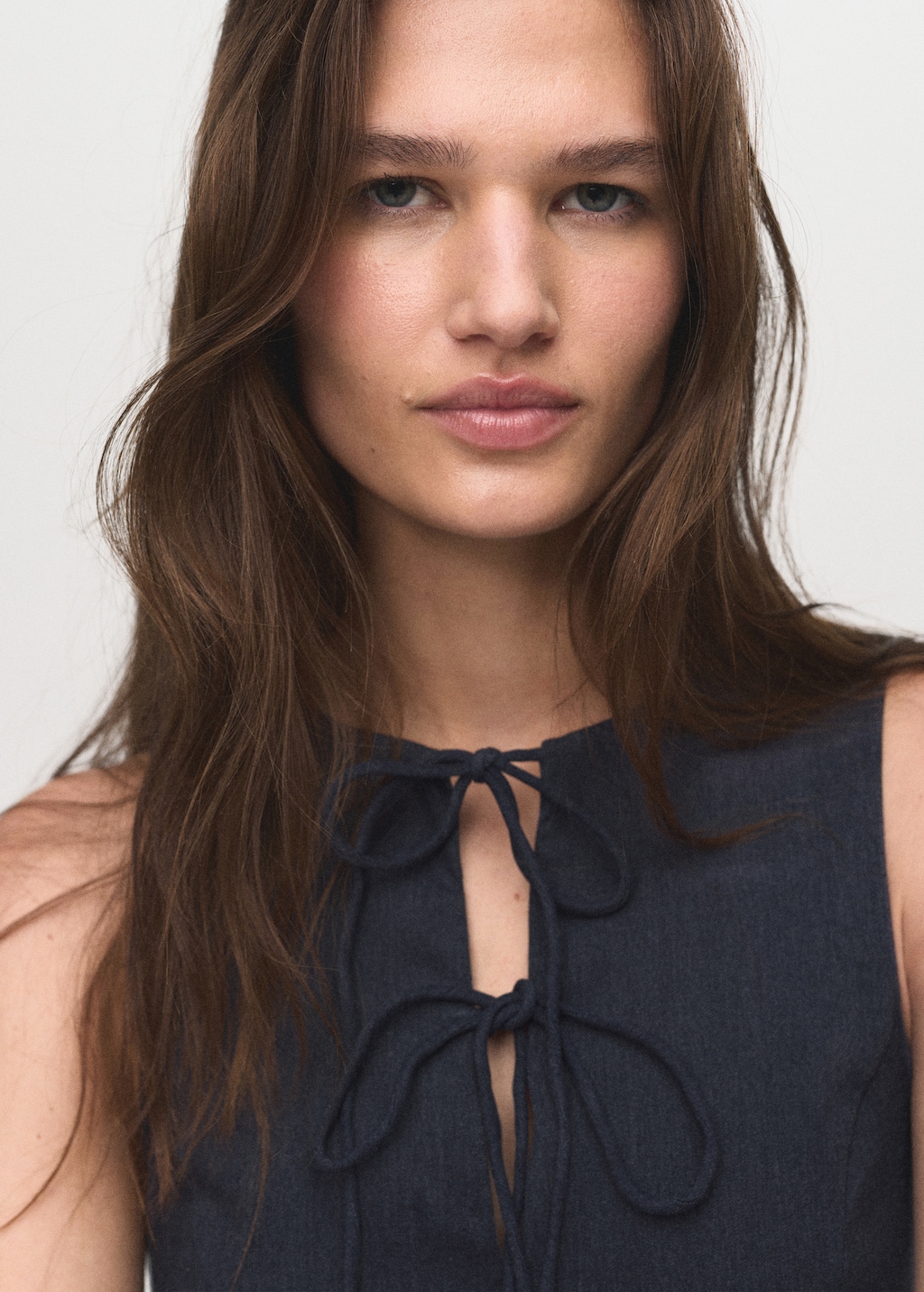 Denim-effect dress with bows