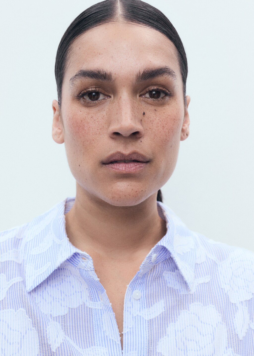 Striped shirt with embroidered details