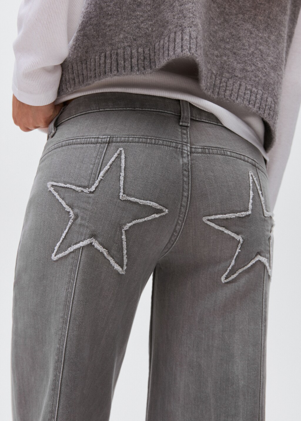 Low-waist jeans with star detail